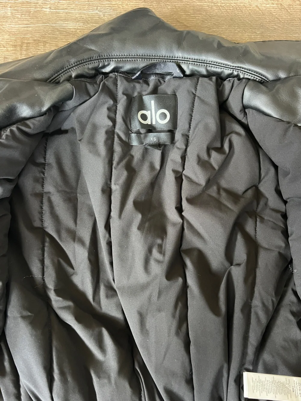 Alo Yoga Faux Leather Cropped Premier Bomber in Black
